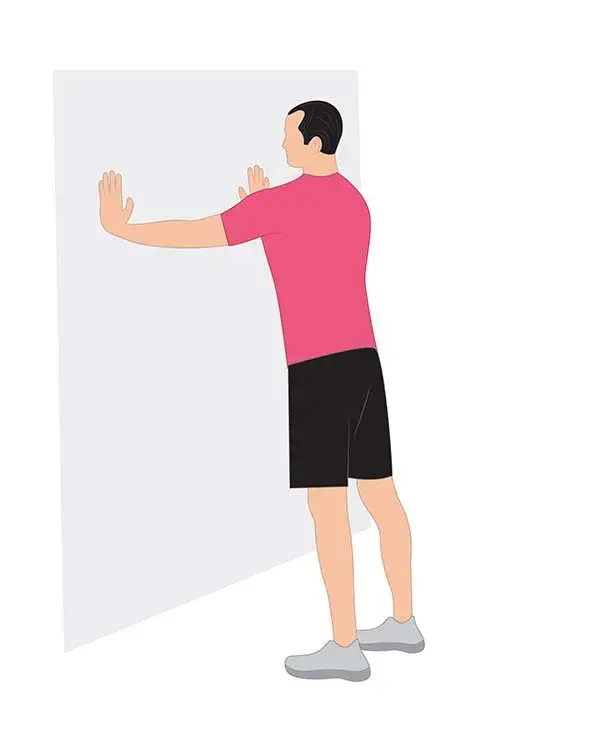 hombre apoyado en la pared
